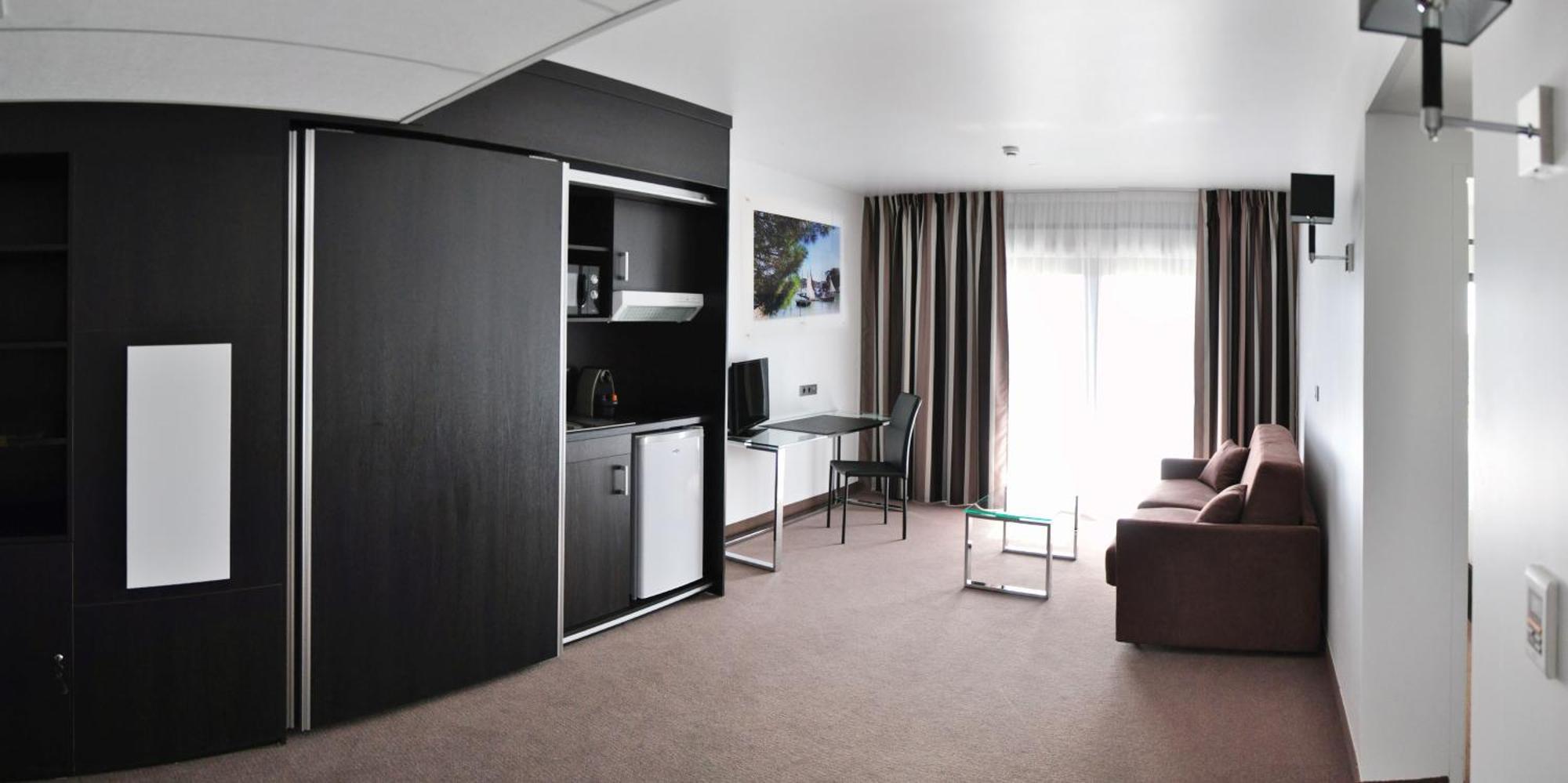 Golden Tulip Pornic Suites- Appart Hotel Стая снимка